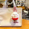 Novo chaveiro de ovelhinha de crochê de pelúcia com tema de sorvete, mascote fofo de ovelha do zodíaco em desenho animado, pingente para bolsa de casal