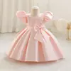 Vestido Novo para Festa de 1º Aniversário de Bebês e Crianças Pequenas 2025 Laço Manga Bufante Vestido Infantil Vestido de Princesa