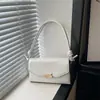 Bolsa de Mão Kelly Estilo Coreano de Nicho 2026 Verão Nova Textura Bolsa de Ombro Único Transversal Grande Capacidade para o Trabalho Bolsa Feminina