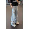 Pantalones vaqueros negros con dobladillo curvo y bordado de dibujos animados para hombre y mujer, estilo americano, desgastados, de talle alto, lavados, de pierna recta y ligeramente acampanados.