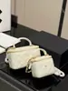 Bolsa feminina matelassê com corrente, nova bolsa caixa, bolsa de ombro moderna e versátil, bolsa transversal de matelassê casual de nicho para batom