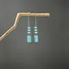 Brincos turquesa estilo étnico vintage europeu e americano, brincos pendentes de borla turquesa boêmios, brincos mais vendidos das áreas cênicas de Yunnan