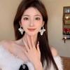 Pendientes de Perla Pétalo Estilo Vacaciones Francesas Aguja de Plata Súper Hada Pendientes de Borla de Concha de Alto Grado y Lujo Temperamento para Mujer