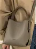 Bolso Cubo de Mano Texturizado y Elegante para Mujer, Nuevo Bolso Tote Pequeño de Moda Primavera 2026 para Viajes Diarios y Uso Cruzado