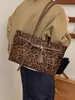 Bolsa Grande Capacidade Retro Simples Feminina 2026 Outono/Inverno Nova Bolsa de Ombro Única para o Dia a Dia Moda Bolsa Tote de Camurça
