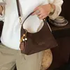 Bolso de axila bolso de mano bolso de hombro nuevo gamuza 2026 coreano diagonal para ir al trabajo moda bandolera exquisito otoño mujer terciopelo lujo ligero día