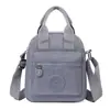 Bolsa feminina 2024 primavera nova bolsa de ombro transfronteiriça moderna tecido de nylon bolsa pequena bolsa mensageiro casual portátil bolsa feminina