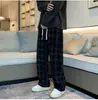 Pantalones de cuadros para hombre de primavera/otoño, largo cropped, estilo japonés moderno, corte recto, casual británico, corte holgado, pantalones vintage de pana