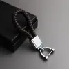 Chaveiro de metal com pingente de corda de couro trançada à mão, chaveiro de carro de metal, corda de chave colorida, botão de empurrar, pequeno presente