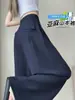 Foto real de los nuevos pantalones anchos holgados de verano 2026, pantalones casuales de cintura alta protectores del sol hasta el suelo, pantalones de lino Tencel para mujer