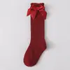 Meias Infantis Novas da Primavera de 2026 Meninas Meia-Calça de Cor Sólida Listrada com Punho Bolha Meia de Algodão com Laço para Bebê Meias de Princesa
