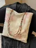Bolso bordado de mujer estilo chino nuevo, gran capacidad, bolso de hombro nuevo de verano 2026, bolso tote de alta gama para el trabajo