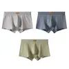 Venta al por mayor de ropa interior de algodón para hombre Huajielong de color liso texturizado, bóxers transpirables de cintura media para tallas grandes, disponibles para dropshipping
