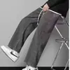 Comercio exterior pantalones de verano sueltos de pierna recta azul claro cintura elástica casual calle alta americana pierna ancha pantalones vaqueros de moda para hombre