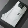 Marca Italiana de Alta Qualidade Tendência Outono e Inverno Juventude Elástico Slim Reto Jeans Preto Estampado de Veludo Espessado para Homens