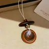 ¡Susurros de Madera para el Cuello! Collar de madera de estilo coreano con diseño geométrico irregular hueco para mujer, diseño de nicho con cordón colgante, nuevo accesorio para el cuello de estilo chino