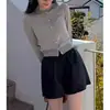 Cardigan de Punto de Color Sólido con Cuello Redondo, Estilo Nuevo de Principios de Primavera 2026 para Mujer, Moderno, Sencillo, Elegante, Adecuado para el Trabajo, Corte Holgado, Top Adelgazante