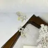 Aretes de Flor de Cuatro Hojas para Mujer, Puestos Callejeros, Suministro para Mercados Nocturnos, Nuevos Aretes Populares de Moda Coreana, Aretes al por Mayor de Fábrica