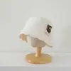Sombrero de pescador para niña estilo coreano, nuevo sombrero de punto elegante para otoño e invierno, sombrero tipo cubo versátil y moderno, sombrero de princesa transfronterizo