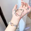 Pulsera de Colgante Flor de Perla y Circonita Nueva Lujo Ligero Gama Alta Versátil Diseño Personalizado Sentido de Diseño Joyería de Mano de Nicho