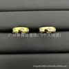 El nuevo modelo transfronterizo de Baomanlanduo, un anillo de alta gama y lujoso con etiquetas y diamantes, tiene una sensación premium. Los anillos de Baoman vienen con álbumes de fotos para venta al por mayor