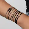 Pulsera de Moda para Mujer Tejida a Mano con Cuentas de Cristal Negro Curvadas y Cuentas de Arroz, Nuevo Set de Múltiples Piezas, Transfronterizo Europeo y Americano