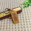 Llave de Madera de Durazno Tallada Lista de Oro Wen Chang Colgante para Llavero Colgante para Bolsa de Llaves de Coche de Madera Regalo Logo Grabado