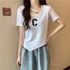 Camiseta Verde Aguacate Asimétrica de Manga Corta para Mujer Verano 2024 Nueva de Media Manga de Algodón Dulce y Picante Aspecto Adelgazante Tops Europeos y Americanos