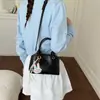 Bolsa Pequena Quadrada Texturizada Estilo Japonês e Coreano para Mulheres 2026 Nova Bolsa de Ombro Transversal de Nicho Estilo Creme Bolsa Feminina Fofa