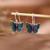 Pendientes de plata S925 con diseño de ciervo dorado y mariposa cloisonné con temperamento artístico. Pendientes de moda de dibujos animados para mujer. Joyería de plata.