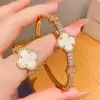 Pulsera y Anillo de Lujo Flor de la Suerte Shell Set Pulsera de Cobre Electrochapado