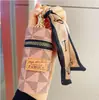 Cartera de monedas vintage europea y americana 2023 nuevo modelo bolsa compacta colgante bolsa para auriculares bolsa para labiales mini bolsa con llavero