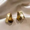 Brincos Olho de Tigre Estilo Melanoid Retro Senso de Design de Nicho Brincos Versáteis Luxo Leve Moda de Alta Qualidade Brincos de Tarraxa para Mulheres