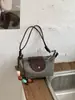Bolsa Dumpling Super Tendência Color-Block de Verão para Mulheres, Novo Modelo 2026, Pequena Bolsa de Mão Transversal Trançada de Luxo de Nicho de Alta Qualidade