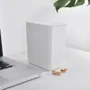 Lixeira de mesa para dormitório branca pura com tampa, lixeira doméstica para quarto e sala de estar, Cesto de papel criativo mini pequeno com tampa