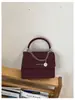 Bolsa Quadrada Pequena Portátil Retro Transfronteiriça Feminina Moda Outono 2026 Simples Ombro Único Trabalho Transversal Bolsa Feminina
