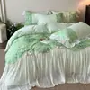 Conjunto de quatro peças estilo francês feminino 100% algodão de fibra longa, capa de edredom e roupa de cama estilo princesa 100% algodão com bordado de renda em formato de tulipa