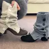 Botas Curtas Retro Francesas com Laço e Salto Grosso 2026 Outono e Inverno Novo Estilo Coreano Botas Meia Botão Elegantes e Versáteis