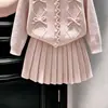 Conjunto de dos piezas de punto dulce color rosa con lazo para niñas, nuevo para otoño 2026, estilo coreano