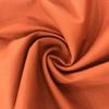En stock tela de algodón elástico teñido liso transpirable monocromático pantalones cortos casuales pantalones de tela de algodón tela textil tela elástica