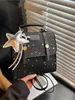 Mochila Coreana 2026 Nova Moda Simples e Estilosa com Padrão de Estrelas, Mochila Minimalista Estilo College para Meninas