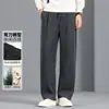 Calça casual masculina com Tencel e lã, novo estilo outono e inverno 2026, cintura elástica, corte reto solto, calça de corte curvo