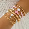 Pulsera Elástica de Cuentas de Arroz Bohemio Multicapa Transfronteriza Europea y Americana Set de Pulseras para Mujer de Color Contrastante de Nicho