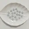 Nuevas Cuentas Sueltas Luminosas Perladas Huecas de Estrella de Cinco Puntas con Agujero Recto para Correas de Teléfono DIY, Estuches para Bolígrafos, Cadenas y Otros Accesorios