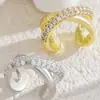 Clip de oreja X-cross único y elegante, de estilo minimalista, transfronterizo europeo y americano, clip para cartílago de la oreja sin perforación, pendientes de cobre con incrustaciones de circonita para mujer
