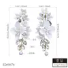 Aretes de lujo, aretes de alta gama, arracadas para mujer, aretes colgantes, aretes tipo ear cuff, diseños únicos.