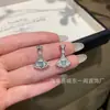 Venta al por mayor de fábrica pequeño camote natural material peligroso azul jade agua colgante de falda s925 plata incrustado diseño pequeño y fresco