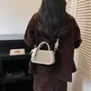 Bolso pequeño cuadrado de moda estilo coreano para mujer, nuevo modelo principios de otoño 2026, bolso de hombro moderno de bloques de color, bolso casual de alto valor para mujer