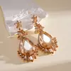 Pendientes colgantes de rombos con borlas tachonados de diamantes de aguja de plata transfronterizos europeos y americanos, pendientes exquisitos y de moda, pendientes versátiles y elegantes al por mayor