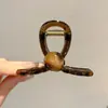 Atacado de acessórios de cabelo Dongdaemun Coreia: Grampos de cabelo da nuca da moda para mulheres, presilhas tubarão de alta qualidade e requintadas